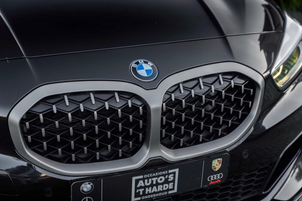 BMW 1-serie M135i xDrive High Executive 306 PK Dealer o.h. Adaptive Head Up Camera Keyless 18''