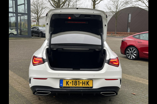 Mercedes-Benz CLA-Klasse 200 Business Solution AMG VAN: €34.900,- | VOOR: €31.877,- | UW E INDEJAARSVOORDEEL: €3.023,- l 1e eigenaar | NL Auto  Panoramadak | Sfeerverlichting | Elektrische stoelen met geheugen | Camera | Apple CarPlay | Rijklaar geleverd met 12 maanden BOVAG-garantie