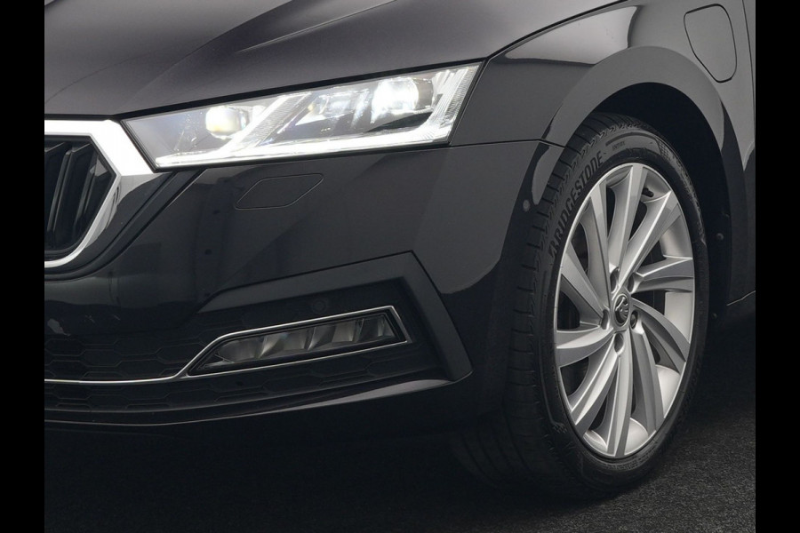 Škoda Octavia Combi 1.4 TSI iV Business Edition Plus Plug In Hybrid 204pk Dealer O.H. PHEV | Trekhaak | Adaptive Cruise | Canton Audio | Alcantara Sportstoelen Memory & Verwarmd | Apple Carplay | Sfeerverlichting | Stuur Verwarmd | Virtual | Navigatie | Keyless |