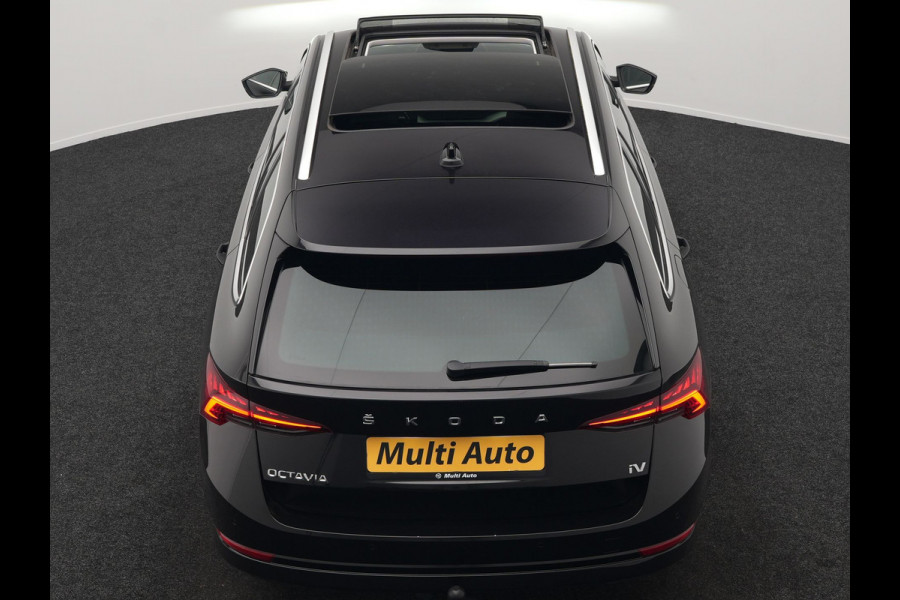 Škoda Octavia Combi 1.4 TSI iV Business Edition Plus Plug In Hybrid 204pk Dealer O.H. PHEV | Trekhaak | Adaptive Cruise | Canton Audio | Alcantara Sportstoelen Memory & Verwarmd | Apple Carplay | Sfeerverlichting | Stuur Verwarmd | Virtual | Navigatie | Keyless |