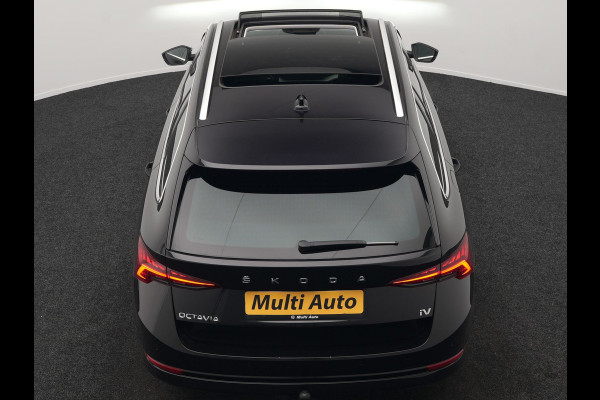 Škoda Octavia Combi 1.4 TSI iV Business Edition Plus Plug In Hybrid 204pk Dealer O.H. PHEV | Trekhaak | Adaptive Cruise | Canton Audio | Alcantara Sportstoelen Memory & Verwarmd | Apple Carplay | Sfeerverlichting | Stuur Verwarmd | Virtual | Navigatie | Keyless |