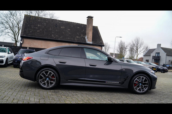 BMW i4 M50 High Executive 84 kWh | BTW | 360 Camera | LASER | Dravitgrau metallic | Adaptieve Cruise | Trekhaak | Schuif/kanteldak