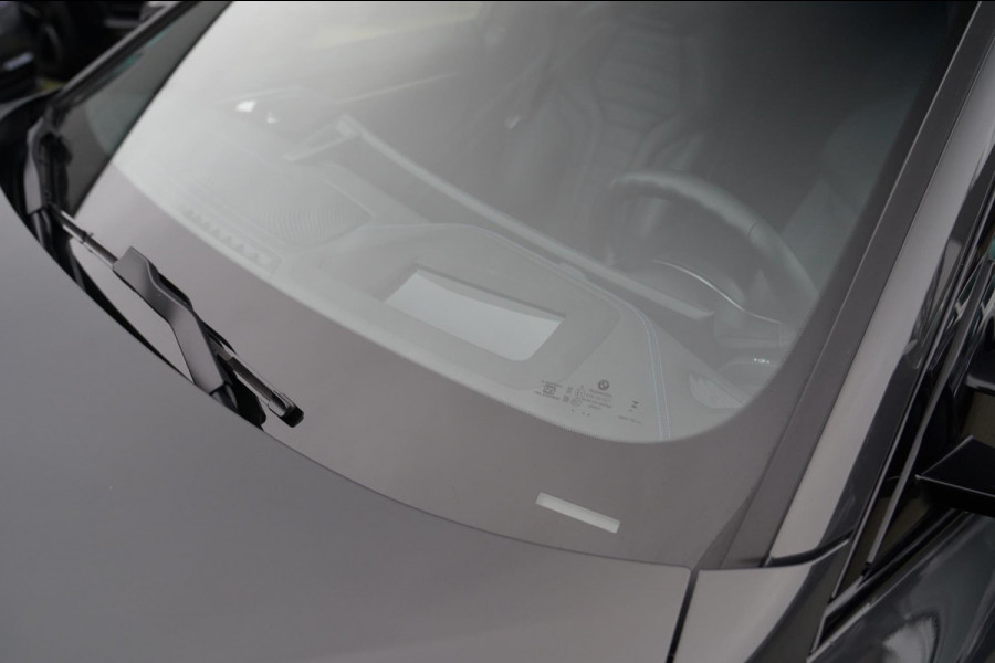 BMW i4 M50 High Executive 84 kWh | BTW | 360 Camera | LASER | Dravitgrau metallic | Adaptieve Cruise | Trekhaak | Schuif/kanteldak