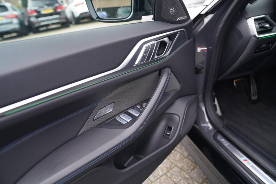BMW i4 M50 High Executive 84 kWh | BTW | 360 Camera | LASER | Dravitgrau metallic | Adaptieve Cruise | Trekhaak | Schuif/kanteldak