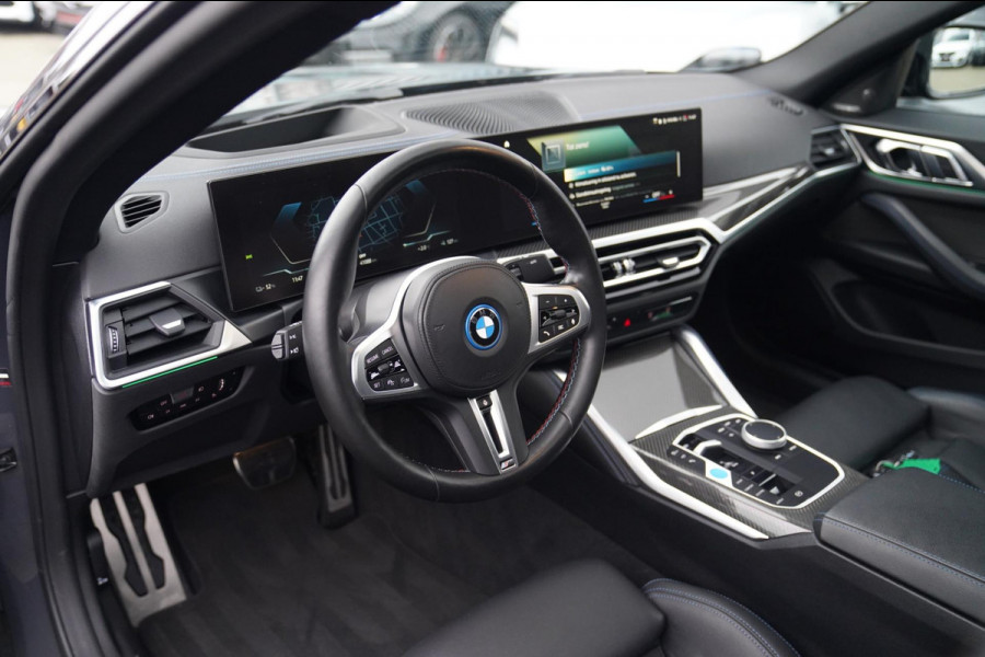 BMW i4 M50 High Executive 84 kWh | BTW | 360 Camera | LASER | Dravitgrau metallic | Adaptieve Cruise | Trekhaak | Schuif/kanteldak