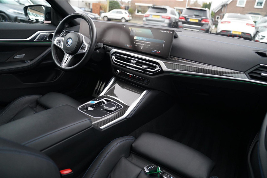 BMW i4 M50 High Executive 84 kWh | BTW | 360 Camera | LASER | Dravitgrau metallic | Adaptieve Cruise | Trekhaak | Schuif/kanteldak