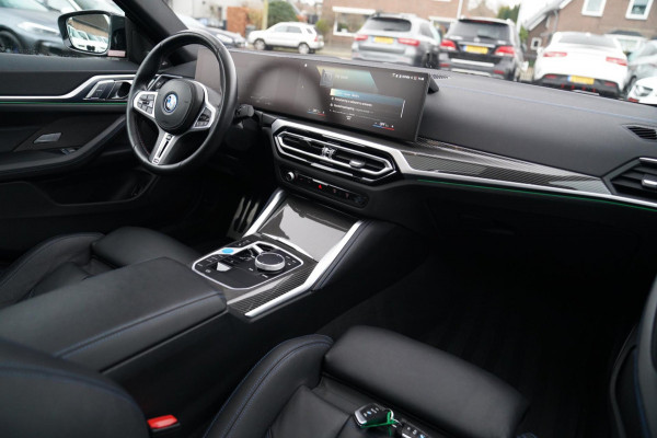 BMW i4 M50 High Executive 84 kWh | BTW | 360 Camera | LASER | Dravitgrau metallic | Adaptieve Cruise | Trekhaak | Schuif/kanteldak