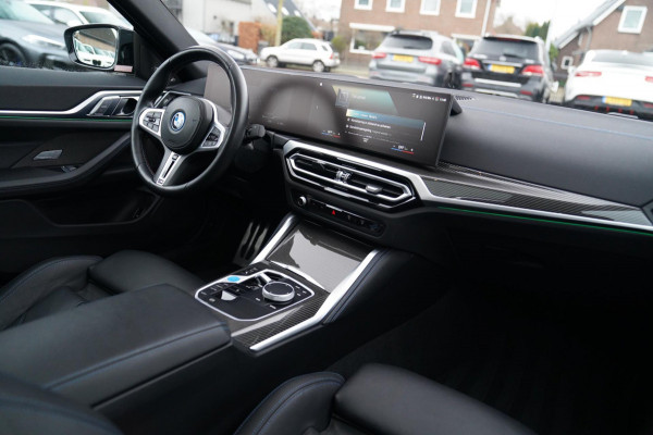 BMW i4 M50 High Executive 84 kWh | BTW | 360 Camera | LASER | Dravitgrau metallic | Adaptieve Cruise | Trekhaak | Schuif/kanteldak