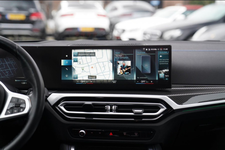 BMW i4 M50 High Executive 84 kWh | BTW | 360 Camera | LASER | Dravitgrau metallic | Adaptieve Cruise | Trekhaak | Schuif/kanteldak