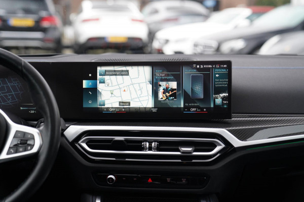 BMW i4 M50 High Executive 84 kWh | BTW | 360 Camera | LASER | Dravitgrau metallic | Adaptieve Cruise | Trekhaak | Schuif/kanteldak