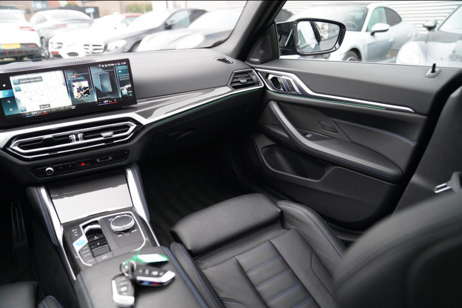 BMW i4 M50 High Executive 84 kWh | BTW | 360 Camera | LASER | Dravitgrau metallic | Adaptieve Cruise | Trekhaak | Schuif/kanteldak