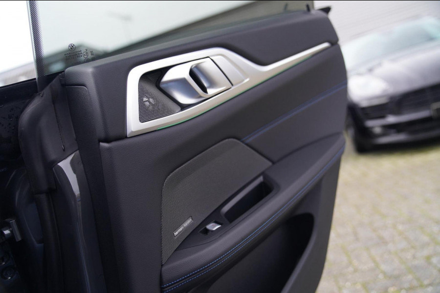 BMW i4 M50 High Executive 84 kWh | BTW | 360 Camera | LASER | Dravitgrau metallic | Adaptieve Cruise | Trekhaak | Schuif/kanteldak