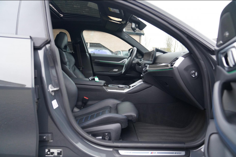 BMW i4 M50 High Executive 84 kWh | BTW | 360 Camera | LASER | Dravitgrau metallic | Adaptieve Cruise | Trekhaak | Schuif/kanteldak