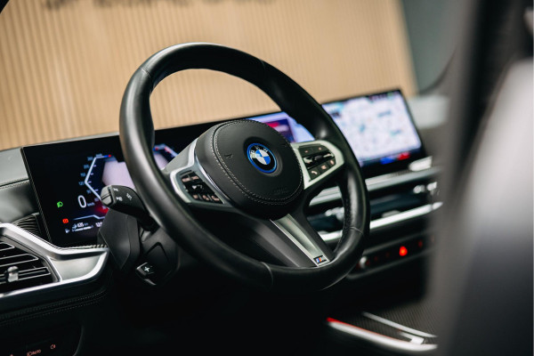 BMW X5 xDrive50e | M uitgevoerd | Trekhaak | Alcantara hemel | Luchtvering | Full PPF in- en exterieur | Skylounge |