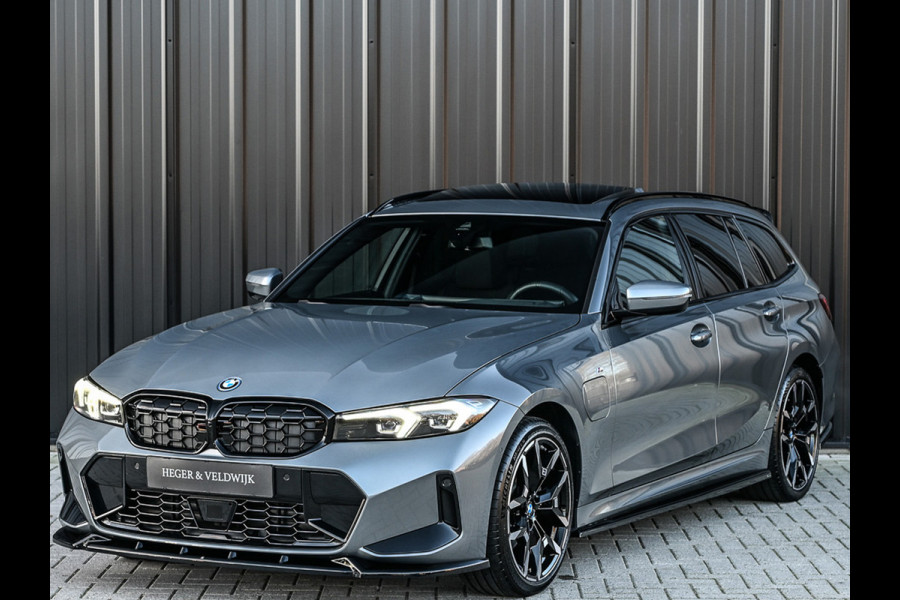 BMW 3 Serie Touring 330e xDrive · M sport · Accu 19,5kWh · Trekhaak · Panoramadak · Active Cruise · Panoramadak · Camera · Ambiance interieu