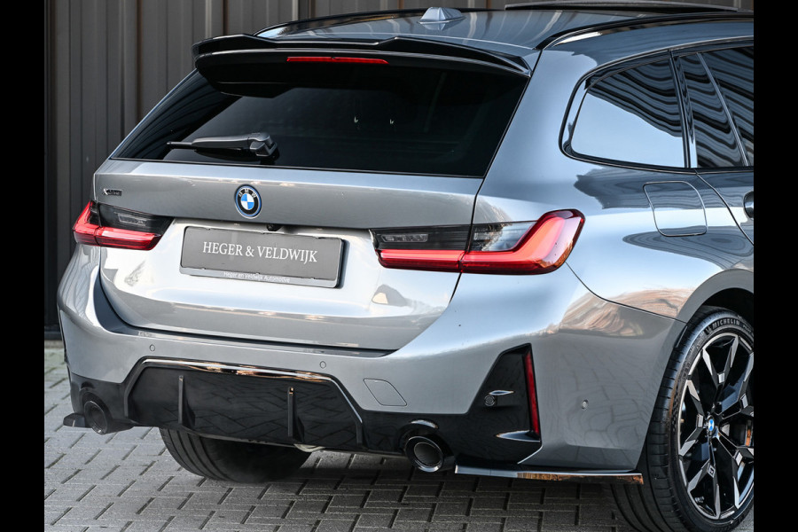 BMW 3 Serie Touring 330e xDrive · M sport · Accu 19,5kWh · Trekhaak · Panoramadak · Active Cruise · Panoramadak · Camera · Ambiance interieu