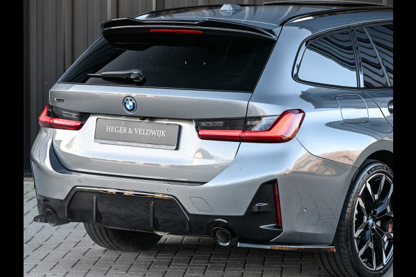 BMW 3 Serie Touring 330e xDrive · M sport · Accu 19,5kWh · Trekhaak · Panoramadak · Active Cruise · Panoramadak · Camera · Ambiance interieu