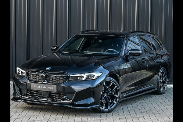 BMW 3 Serie Touring 330e xDrive · M sport · Accu 19,5kWh · Trekhaak · Active Cruise · Camera · Ambiance interieur · Full Styling
