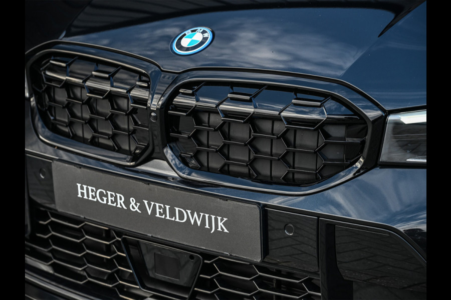 BMW 3 Serie Touring 330e xDrive · M sport · Accu 19,5kWh · Trekhaak · Active Cruise · Camera · Ambiance interieur · Full Styling