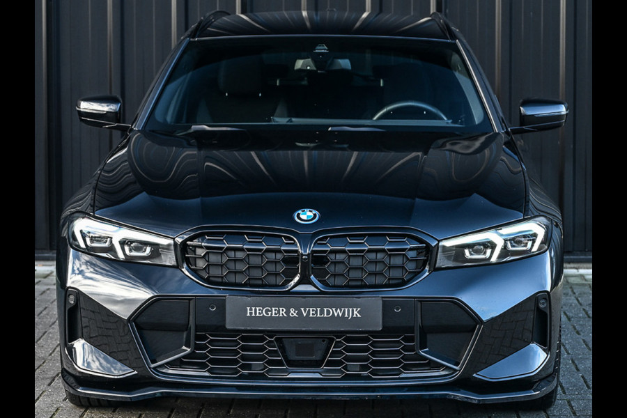 BMW 3 Serie Touring 330e xDrive · M sport · Accu 19,5kWh · Trekhaak · Active Cruise · Camera · Ambiance interieur · Full Styling