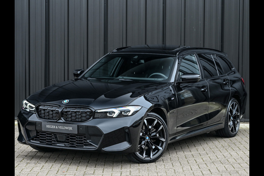 BMW 3 Serie Touring 330e xDrive · M sport · Accu 19,5kWh · Trekhaak · Panoramadak · Active Cruise · Camera · Ambiance interieur ·
