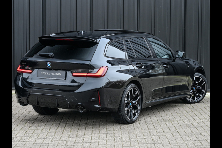 BMW 3 Serie Touring 330e xDrive · M sport · Accu 19,5kWh · Trekhaak · Panoramadak · Active Cruise · Camera · Ambiance interieur ·