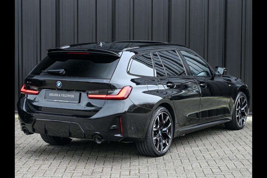 BMW 3 Serie Touring 330e xDrive · M sport · Accu 19,5kWh · Trekhaak · Panoramadak · Active Cruise · Camera · Ambiance interieur ·