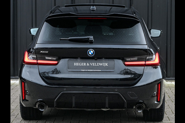BMW 3 Serie Touring 330e xDrive · M sport · Accu 19,5kWh · Trekhaak · Panoramadak · Active Cruise · Camera · Ambiance interieur ·