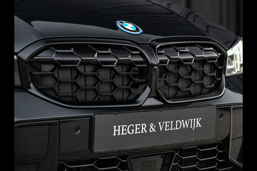 BMW 3 Serie Touring 330e xDrive · M sport · Accu 19,5kWh · Trekhaak · Panoramadak · Active Cruise · Camera · Ambiance interieur ·
