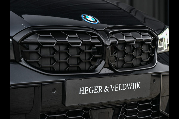 BMW 3 Serie Touring 330e xDrive · M sport · Accu 19,5kWh · Trekhaak · Panoramadak · Active Cruise · Camera · Ambiance interieur ·