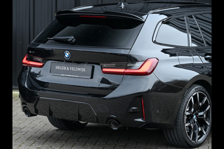 BMW 3 Serie Touring 330e xDrive · M sport · Accu 19,5kWh · Trekhaak · Panoramadak · Active Cruise · Camera · Ambiance interieur ·