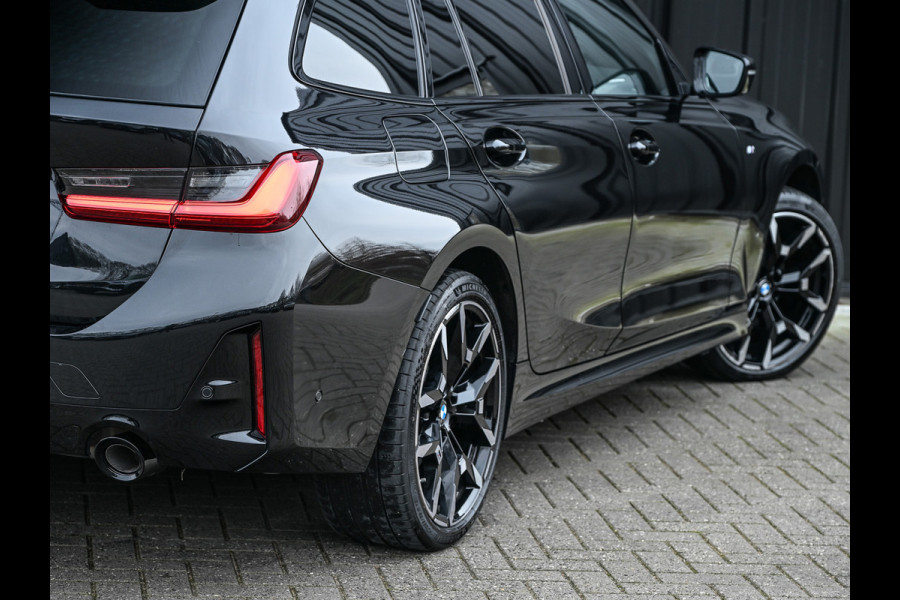 BMW 3 Serie Touring 330e xDrive · M sport · Accu 19,5kWh · Trekhaak · Panoramadak · Active Cruise · Camera · Ambiance interieur ·