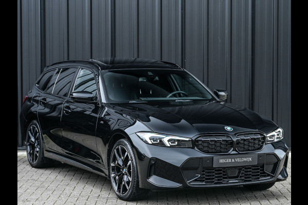 BMW 3 Serie Touring 330e xDrive · M sport · Accu 19,5kWh · Trekhaak · Panoramadak · Active Cruise · Camera · Ambiance interieur ·