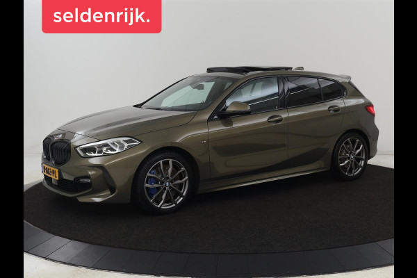 BMW 1-serie 118i M Sport | Panoramadak | Leder | Stoelverwarming | Carplay | Sfeerverlichting | Camera | Live Cockpit | Sportstoelen | Navigatie | Park Assist