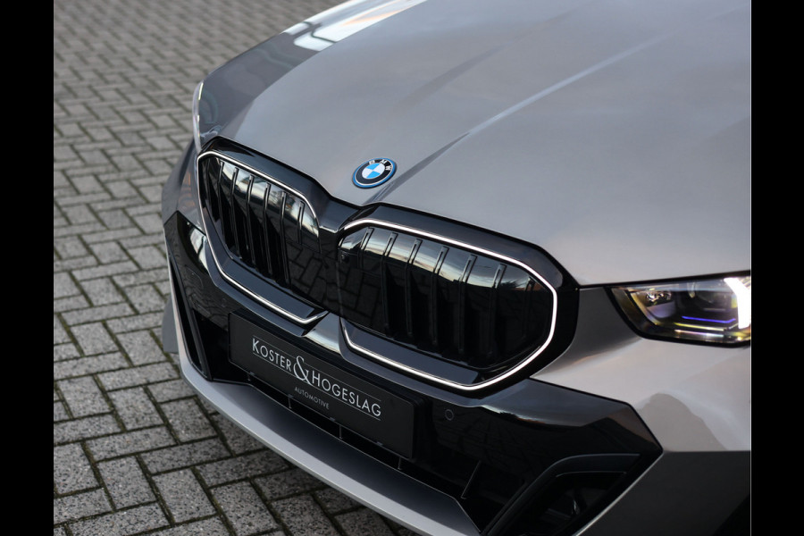 BMW 5 Serie Touring 550e xDrive | Oxid Grey - M Sport Pro