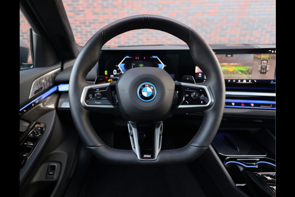 BMW 5 Serie Touring 550e xDrive | Oxid Grey - M Sport Pro