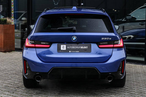 BMW 3 Serie Touring 330e | M-Sport Pro | 2 jaar garantie | Pano | ACC | LCI | Black Edition | Sfeerverlichting | Driving Assistant