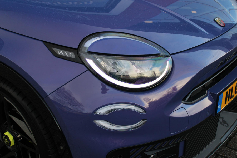 Abarth 600e SCORPIONISSIMA 280PK 54 kWh | SABELT PERFROMANCE SPORTOELEN/BEKLEDING | ENGINE SOUND GENERATOR | PACK DESIGN SCORPIONISSIMA | PACK TECH SCORPIONISSIMA | PACK WINTER (STOEL VERWARMING/VOORRUITVERWARMING) | PACK SCORPION | 20" LICHTMETALEN VELGEN | ABARTH BODYKIT | 360° PARKEERSENSOREN | REMKLAUWEN GROEN | ELEKTRISCH BEDIENBARE BESTUURDERSSTOEL | AMBIANCE INTERIEUR VERLICHTING | ACHTERUITRIJ CAMERA | ADAPTIVE CRUISE CONTROL | DRAADLOZE APPLE CARPLAY/ANDROID AUTO | DODEHOEK DETECTIE | DC SNELLAAD FUNCTIE | DRAADLOZE APPLE CARPLAY/ANDROID AUTO | ELEKTRISCH BEDIENBARE ACHTE