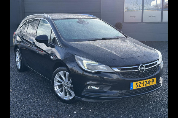 Opel Astra Sports Tourer 1.4 Innovation Navi,Camera,150pk,Rijstrooksensor,Stoelverw.Stuurverw.Clima,Cruise,Halfleder,Lm velgen,Pdc,V+A,Lm velgen,6 Bak,Apk tot 10-2026