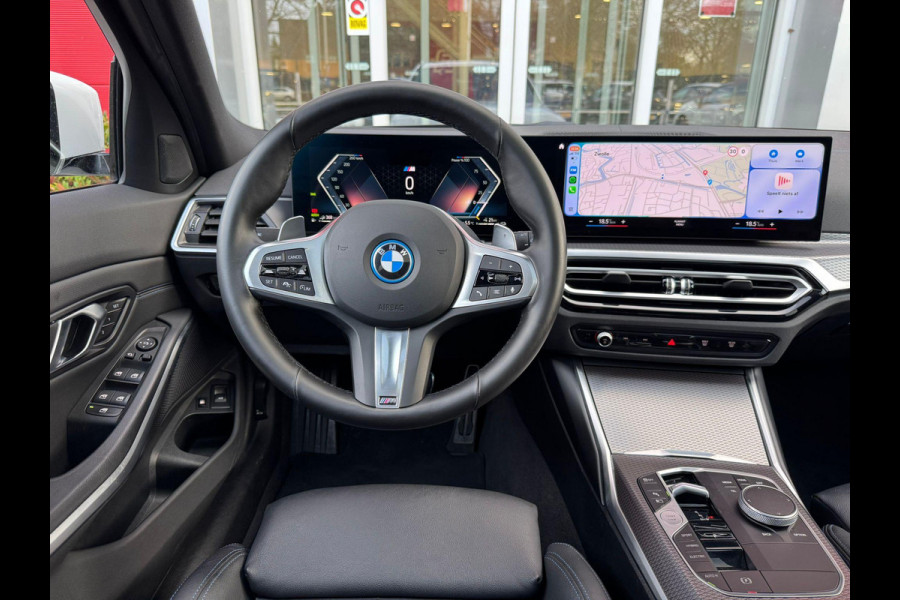 BMW 3 Serie Touring 330e 292PK M-SPORT | PANORAMISCH SCHUIF/KANTEL DAK | M-SPORT PRO-PAKKET | M-SPORT REMMEN UITGEVOERD IN DONKERBLAUW MET M LOGO | BMW LIVE COCKPIT PROFESSIONAL | CURVED DISPLAY |DRIVING ASSISTANT INCL. HEAD-UP DISPLAY | PARKING ASSIST INCL. ACHTERUITRIJCAMERA | ADAPTIEVE LED KOPLAMPEN |SHADOW LINE | M-SPORTSTOELEN VOOR | LEDER VERNASCA MET CONTRAST STIKSELS M-SPORT | STOEL VERWARMING | DRAADLOZE APPLE CARPLAY | ELEKTRISCH VERSTELBARE STOELEN MET GEHEUGEN FUNCTIE | HEAD UP DISPLAY | DRAADLOZE TELEFOONLADER | DODEHOEK BEWAKING | COMFORT PACK INCL. ELEKTRISCHE ACHTE