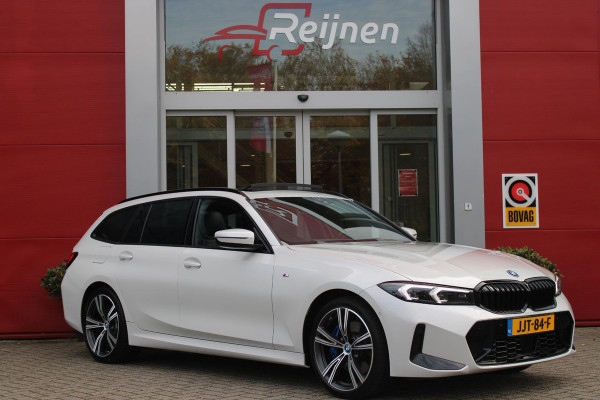 BMW 3 Serie Touring 330e 292PK M-SPORT | PANORAMISCH SCHUIF/KANTEL DAK | M-SPORT PRO-PAKKET | M-SPORT REMMEN UITGEVOERD IN DONKERBLAUW MET M LOGO | BMW LIVE COCKPIT PROFESSIONAL | CURVED DISPLAY |DRIVING ASSISTANT INCL. HEAD-UP DISPLAY | PARKING ASSIST INCL. ACHTERUITRIJCAMERA | ADAPTIEVE LED KOPLAMPEN |SHADOW LINE | M-SPORTSTOELEN VOOR | LEDER VERNASCA MET CONTRAST STIKSELS M-SPORT | STOEL VERWARMING | DRAADLOZE APPLE CARPLAY | ELEKTRISCH VERSTELBARE STOELEN MET GEHEUGEN FUNCTIE | HEAD UP DISPLAY | DRAADLOZE TELEFOONLADER | DODEHOEK BEWAKING | COMFORT PACK INCL. ELEKTRISCHE ACHTE