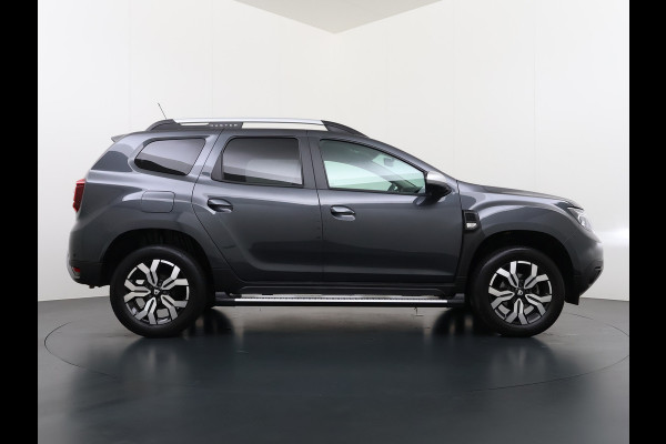 Dacia Duster T92pk TCe Bi-Fuel LPG Trekhaak 360°Camera Apple Carplay/Android AutoEcc Navi* Cruise Control Pdc Prestige Lmv 17" Bluetooth Privacy Glas Keyless Dodehoek detector Led LPG