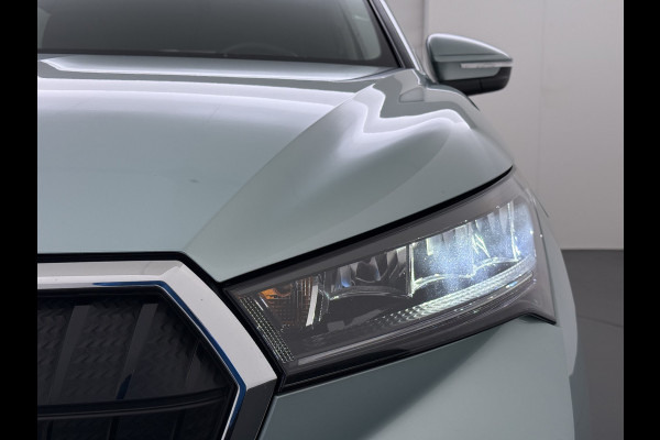 Škoda ENYAQ iV Warmtepomp Trekhaak 21"LM Apple Carplay Android 1/2 Leer Navi Ecc Camera Cruise Control SOH 93% Comfort-pakket  Privacy Glas Keyless advanced Climate-pakket Parkeer pakket 180pk iv60 1e Eigenaar Origineel Nederlandse Auto Zeer Compleet! 1.000kg trekvermogen € 48.500 nieuw