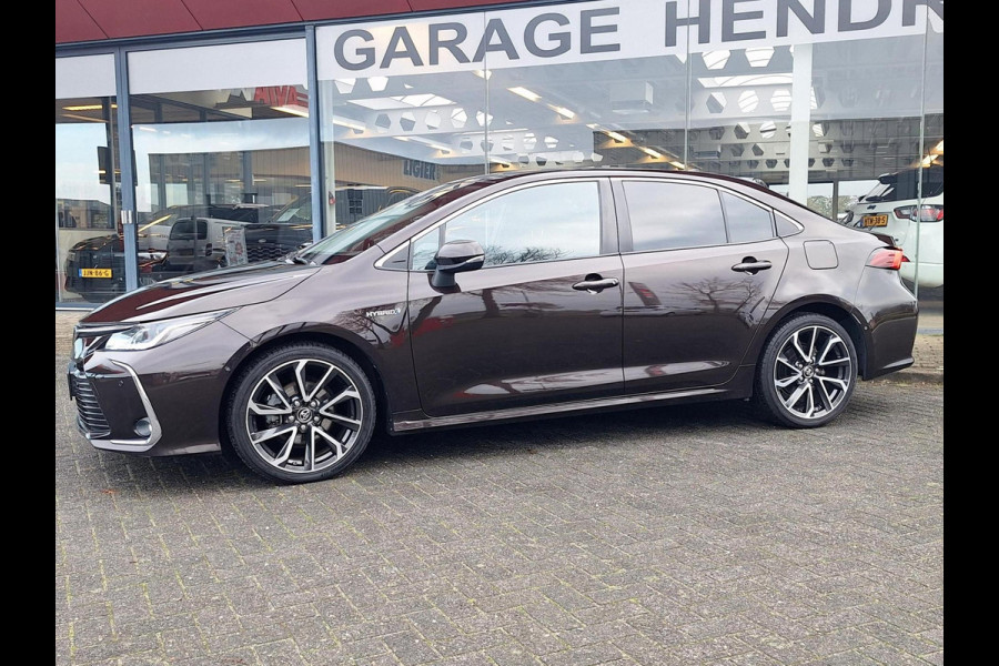 Toyota Corolla 1.8 Hybrid Executive Sedan | Trekhaak | Blindspot | Adaptive CC | Leder-Stof | Occasion