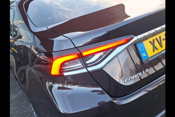 Toyota Corolla 1.8 Hybrid Executive Sedan | Trekhaak | Blindspot | Adaptive CC | Leder-Stof | Occasion