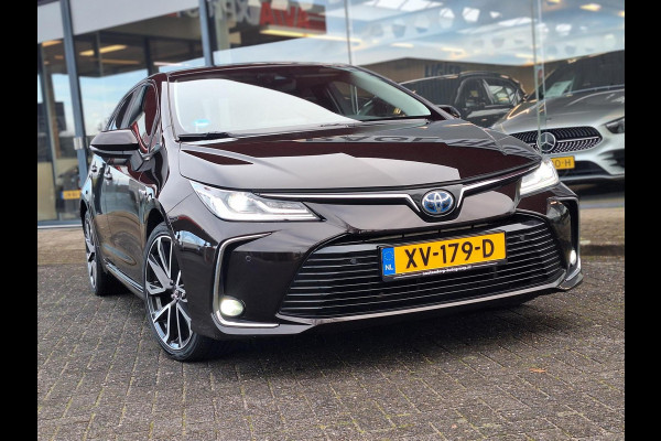 Toyota Corolla 1.8 Hybrid Executive Sedan | Trekhaak | Blindspot | Adaptive CC | Leder-Stof | Occasion