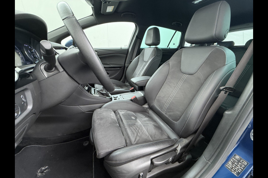 Opel Astra Sports Tourer 1.2T Leer/Alcantara Led-Matrix Innovation Bose®-Hifi Navi Camera Park-Assist + PDC-a+v Apple Carplay Android Keyle AGR-Comfort-Stoel+Stuur+Voorruitverwarming Elek.Achterklep Pdc Lane Assist DAB Regen-Lichtsensor Bordherkenning Zwarte-Hemel Origineel Nederlandse Auto Zeer luxe uitvoering! A-Label EURO6  € 30.000 nieuw