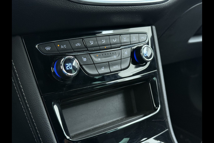 Opel Astra Sports Tourer 1.2T Leer/Alcantara Led-Matrix Innovation Bose®-Hifi Navi Camera Park-Assist + PDC-a+v Apple Carplay Android Keyle AGR-Comfort-Stoel+Stuur+Voorruitverwarming Elek.Achterklep Pdc Lane Assist DAB Regen-Lichtsensor Bordherkenning Zwarte-Hemel Origineel Nederlandse Auto Zeer luxe uitvoering! A-Label EURO6  € 30.000 nieuw