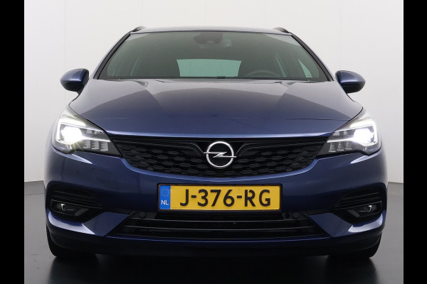 Opel Astra Sports Tourer 1.2T Leer/Alcantara Led-Matrix Innovation Bose®-Hifi Navi Camera Park-Assist + PDC-a+v Apple Carplay Android Keyle AGR-Comfort-Stoel+Stuur+Voorruitverwarming Elek.Achterklep Pdc Lane Assist DAB Regen-Lichtsensor Bordherkenning Zwarte-Hemel Origineel Nederlandse Auto Zeer luxe uitvoering! A-Label EURO6  € 30.000 nieuw