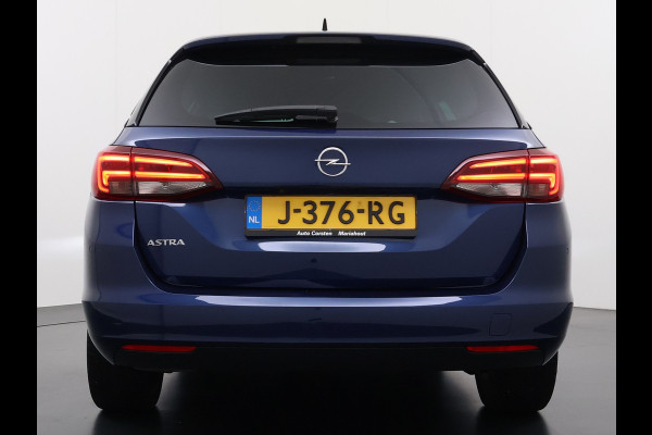 Opel Astra Sports Tourer 1.2T Leer/Alcantara Led-Matrix Innovation Bose®-Hifi Navi Camera Park-Assist + PDC-a+v Apple Carplay Android Keyle AGR-Comfort-Stoel+Stuur+Voorruitverwarming Elek.Achterklep Pdc Lane Assist DAB Regen-Lichtsensor Bordherkenning Zwarte-Hemel Origineel Nederlandse Auto Zeer luxe uitvoering! A-Label EURO6  € 30.000 nieuw